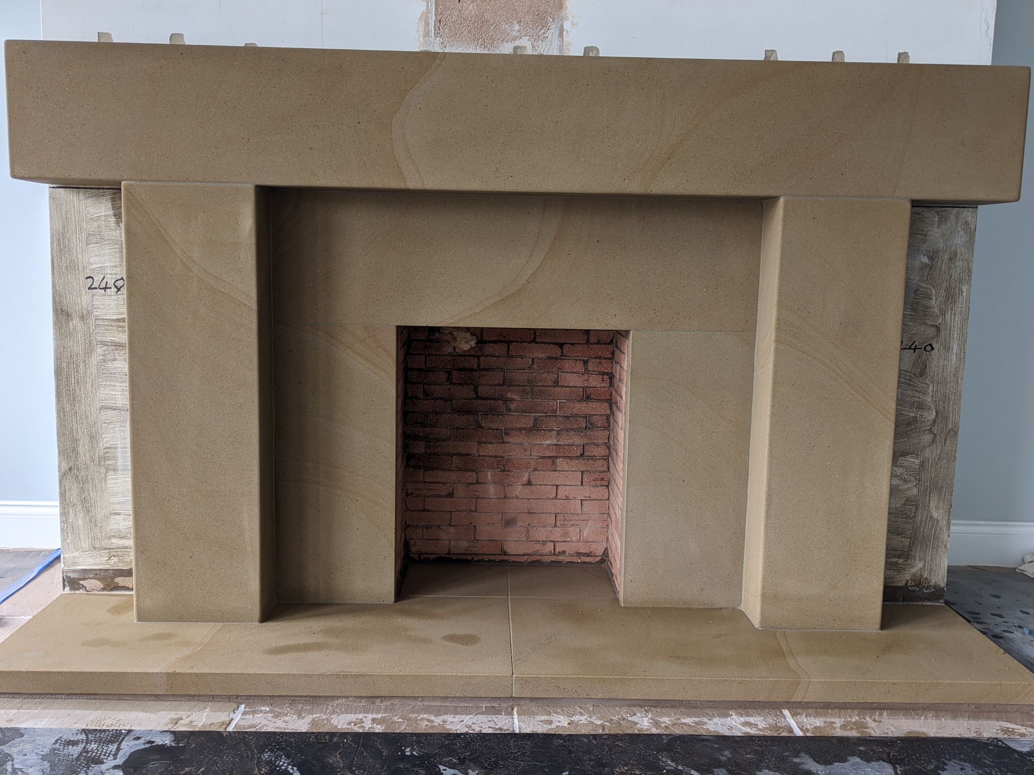 Large bespoke Lancashire sandstone fireplace Surround